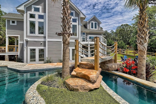 pool with french doors