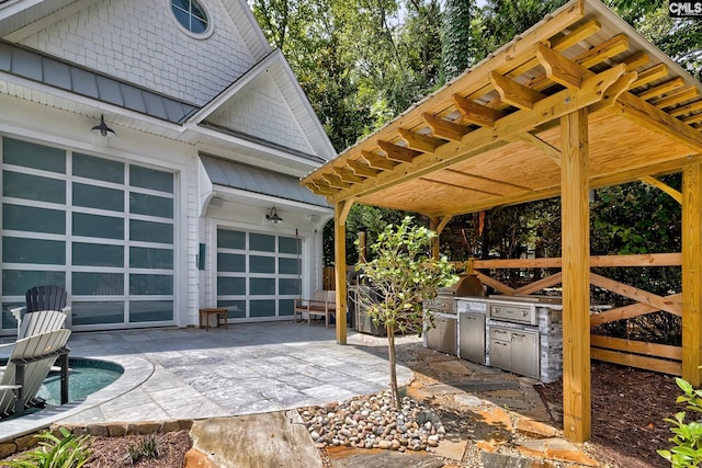 view of patio / terrace with driveway and area for grilling