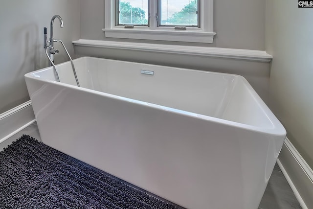 interior details featuring a freestanding tub