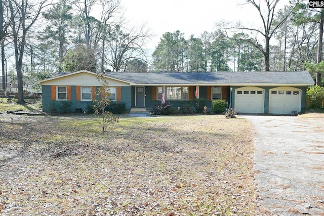 ranch-style home with a garage