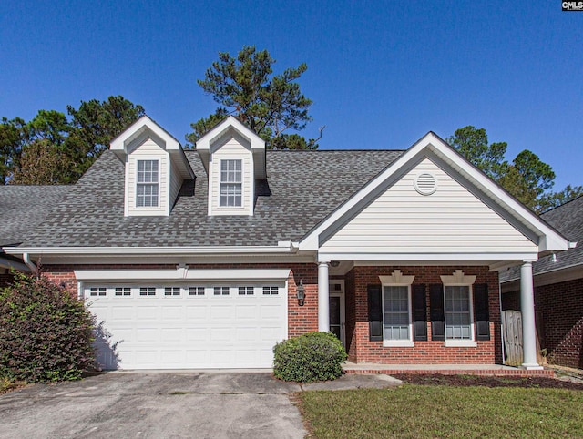 view of front of property with covered porch and a front yard