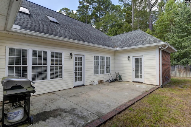 rear view of house featuring a patio area