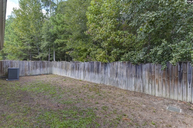 view of yard featuring central AC