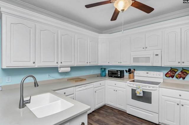 kitchen featuring white appliances, sink, dark hardwood / wood-style floors, ornamental molding, and white cabinetry