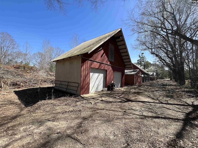 view of outbuilding with a garage