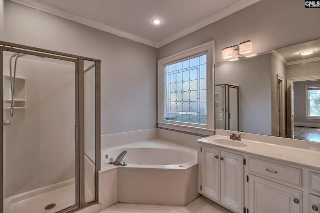 bathroom featuring tile patterned flooring, vanity, a healthy amount of sunlight, and plus walk in shower