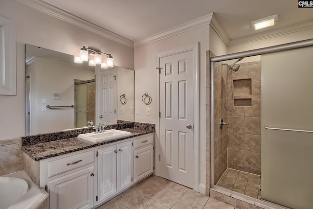 bathroom with tile patterned floors, vanity, crown molding, and plus walk in shower