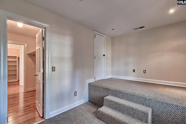 unfurnished room featuring hardwood / wood-style floors