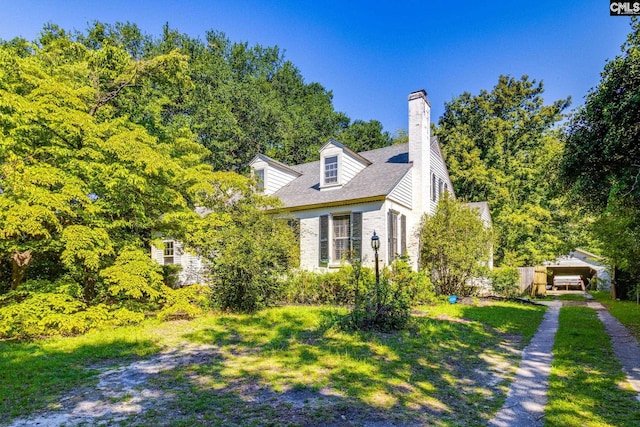 exterior space featuring a front yard