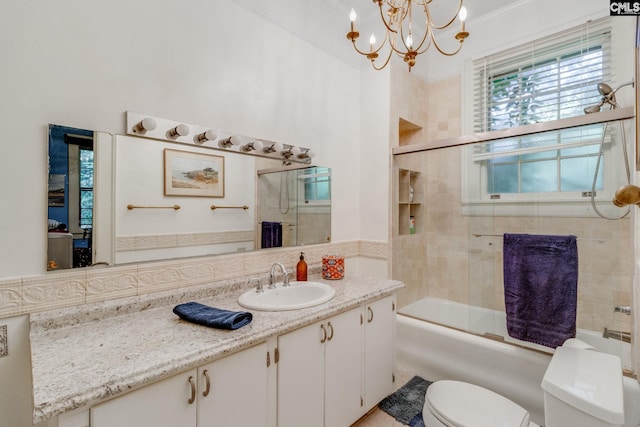 full bathroom with vanity, toilet, enclosed tub / shower combo, tasteful backsplash, and a notable chandelier