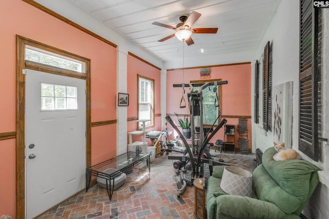 workout room featuring ceiling fan