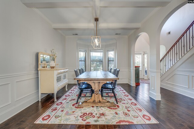 dining room with beam ceiling, dark hardwood / wood-style floors, coffered ceiling, and ornamental molding