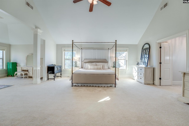 unfurnished bedroom featuring ceiling fan, high vaulted ceiling, and light carpet