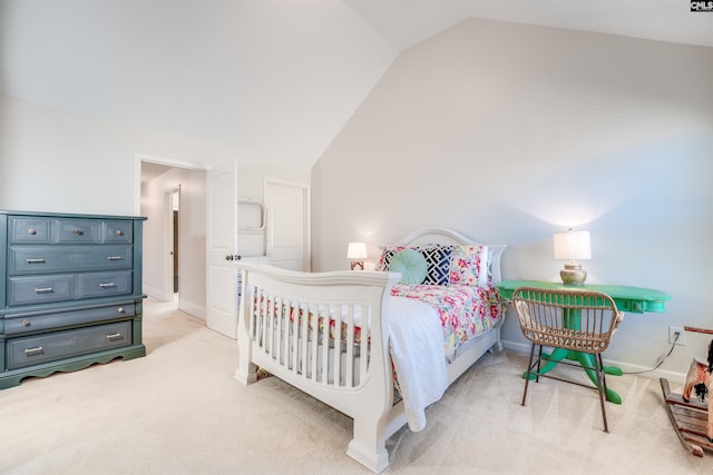 carpeted bedroom with vaulted ceiling