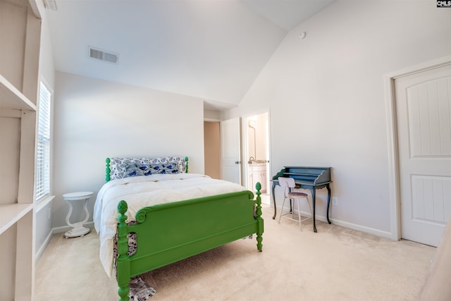 carpeted bedroom featuring vaulted ceiling