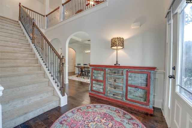 foyer entrance with dark hardwood / wood-style flooring