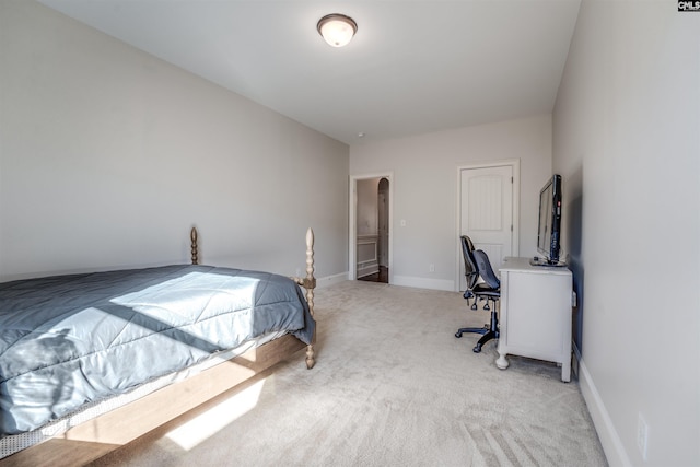 bedroom with light carpet