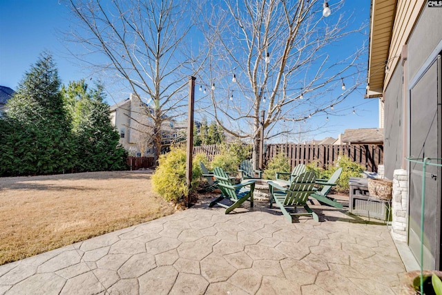 view of patio / terrace with a fire pit