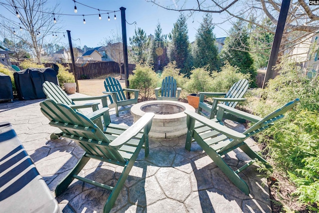 view of patio with an outdoor fire pit