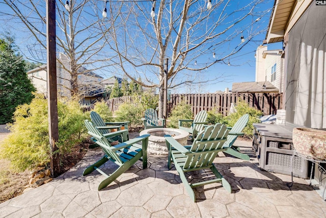 view of patio featuring a fire pit