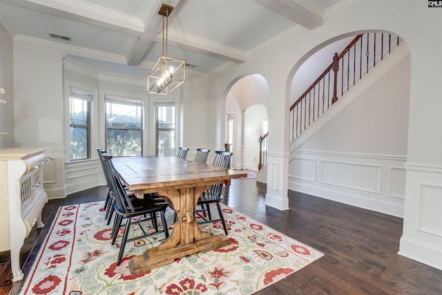 dining area with beam ceiling, coffered ceiling, dark hardwood / wood-style flooring, a chandelier, and ornamental molding