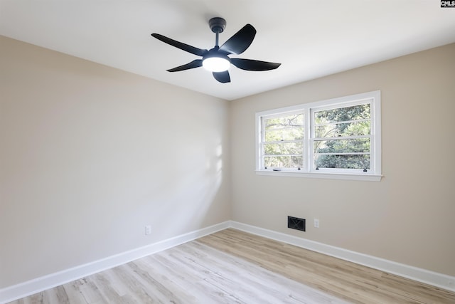 unfurnished room featuring ceiling fan and light hardwood / wood-style flooring