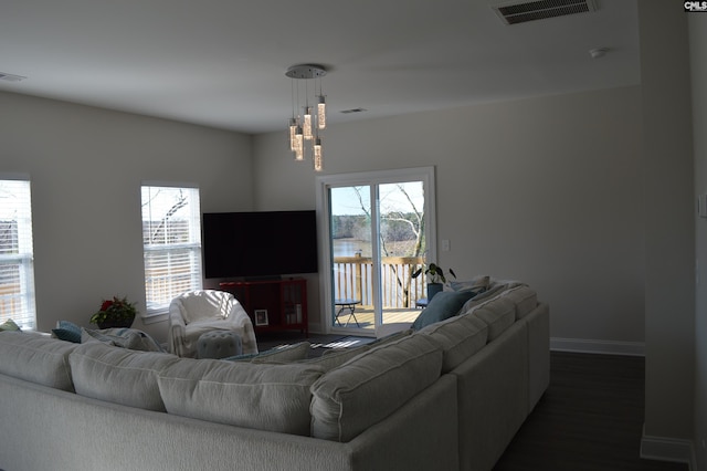 living room with dark wood-type flooring