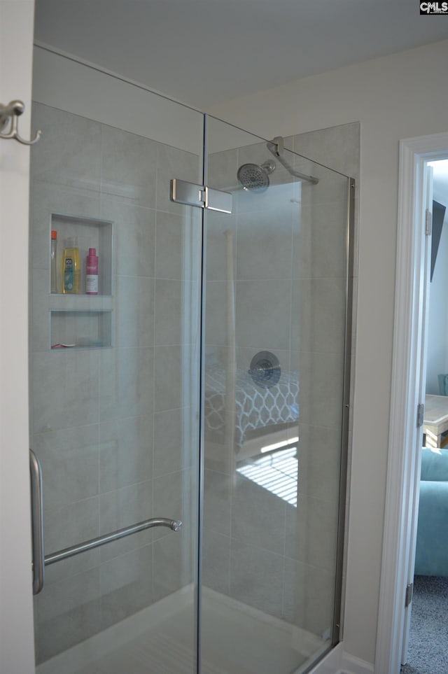 bathroom featuring an enclosed shower