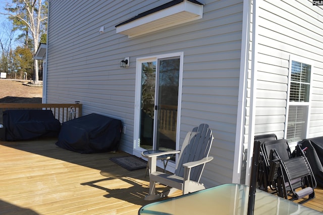 wooden terrace with grilling area