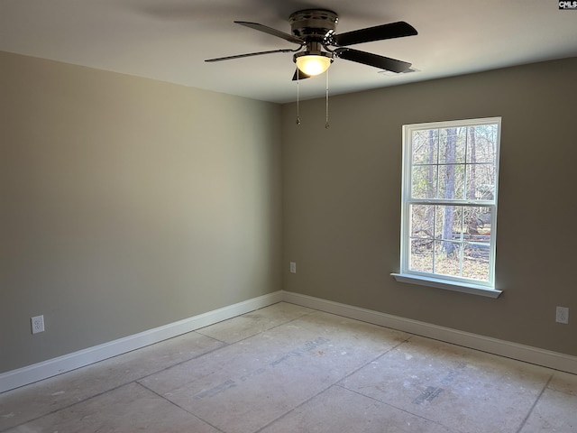 spare room with ceiling fan