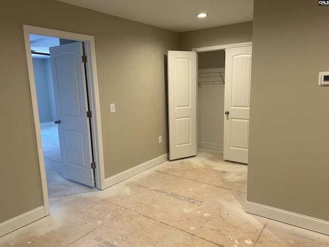 unfurnished bedroom with a closet