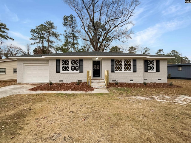 ranch-style home featuring a front lawn and a garage