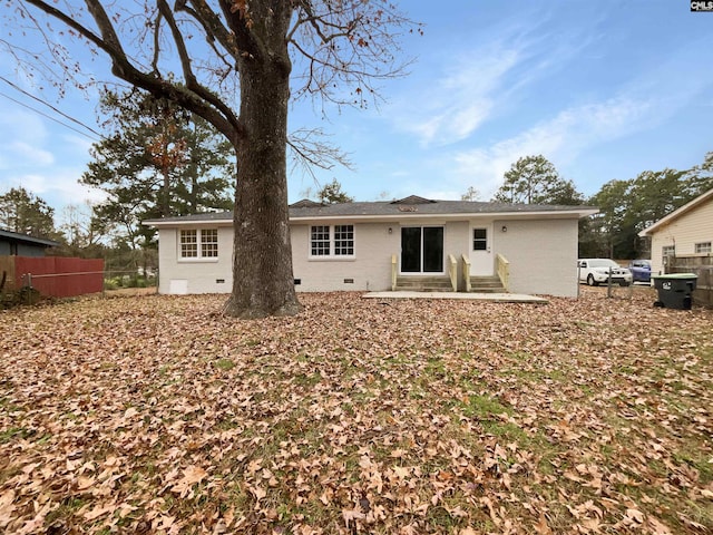 rear view of property featuring a patio area