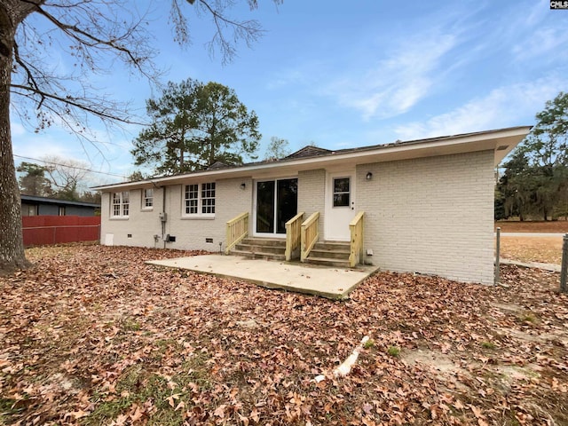 rear view of property with a patio area