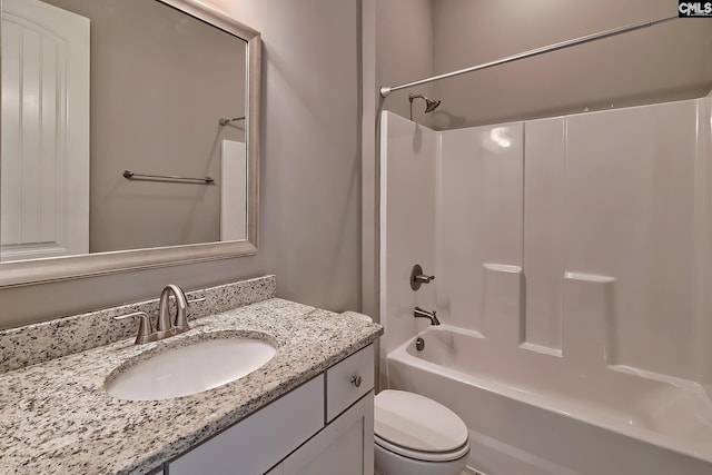 full bathroom with shower / bathing tub combination, vanity, and toilet