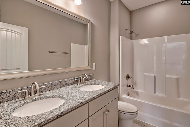 full bathroom featuring bathtub / shower combination, vanity, toilet, and tile patterned flooring