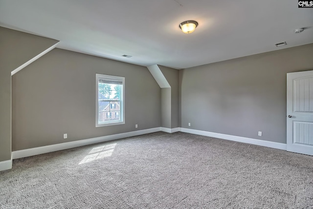 bonus room with carpet floors