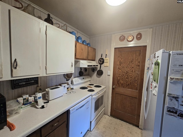 kitchen with white cabinetry, white appliances, and crown molding