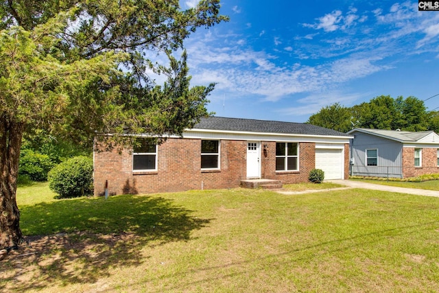 ranch-style house with a front yard and a garage