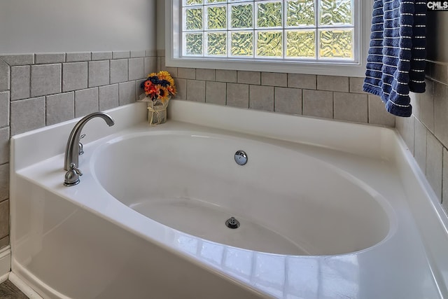 bathroom featuring a tub