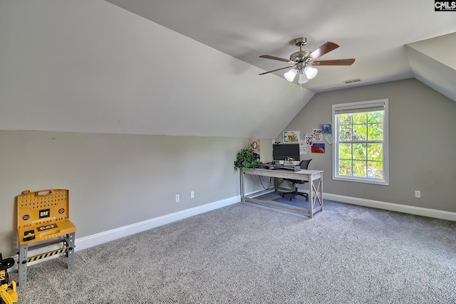 office space featuring carpet flooring, vaulted ceiling, and ceiling fan