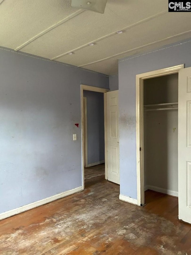 unfurnished bedroom featuring a closet