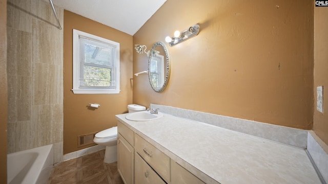 full bathroom featuring vanity, toilet, lofted ceiling, and tub / shower combination