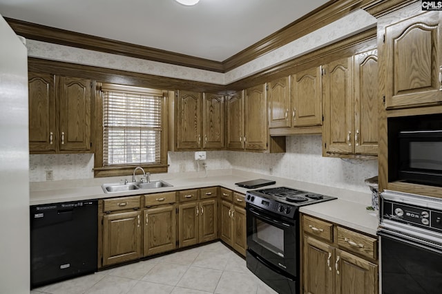 kitchen featuring sink, light tile patterned flooring, black appliances, and ornamental molding