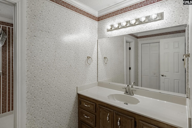 bathroom featuring vanity and crown molding