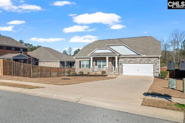 craftsman house with a garage