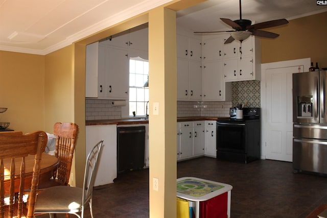 kitchen with black appliances, white cabinetry, and tasteful backsplash