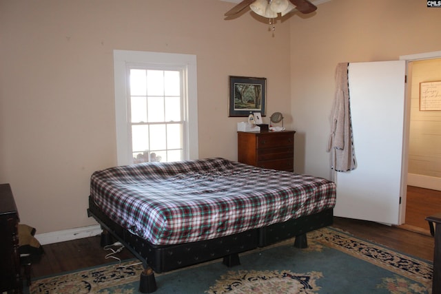 bedroom with wood-type flooring and ceiling fan