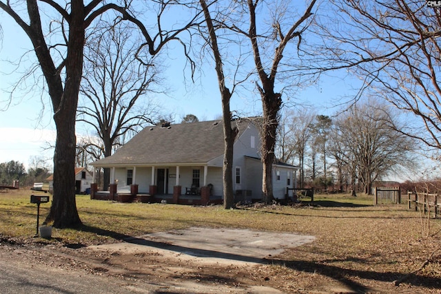 exterior space featuring a front yard and a porch