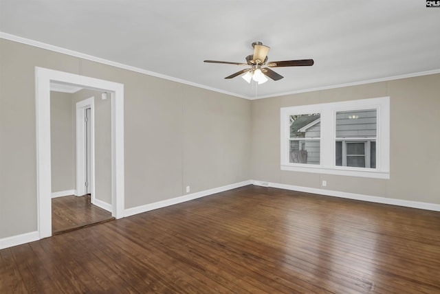 spare room featuring ceiling fan, crown molding, and dark hardwood / wood-style floors